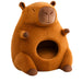 Cat sleeping in capybara-shaped bed - Neko.sg